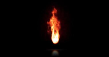 verdadeira chama de fogo queimando, isolada no escuro e refletindo no chão. pode ser uma tocha acesa à noite. animação 4k abstrata video