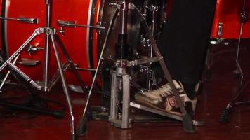 boy playing drum set in the room on the stage video