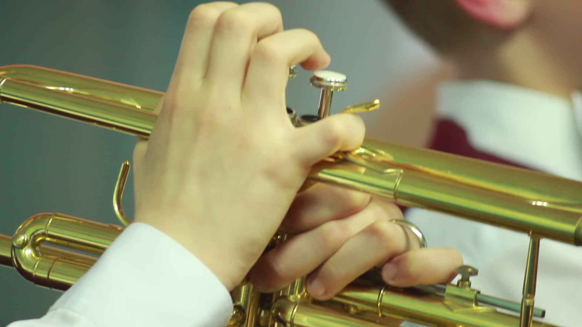 man's hands playing a wind instrument 13529357 Stock Video at Vecteezy