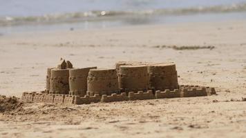 Sand castle fortress on the tropical beach video