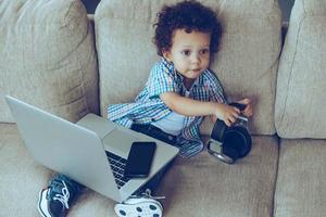 Boy with laptop photo