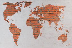 World map. Close-up image of brick world map on the wall photo