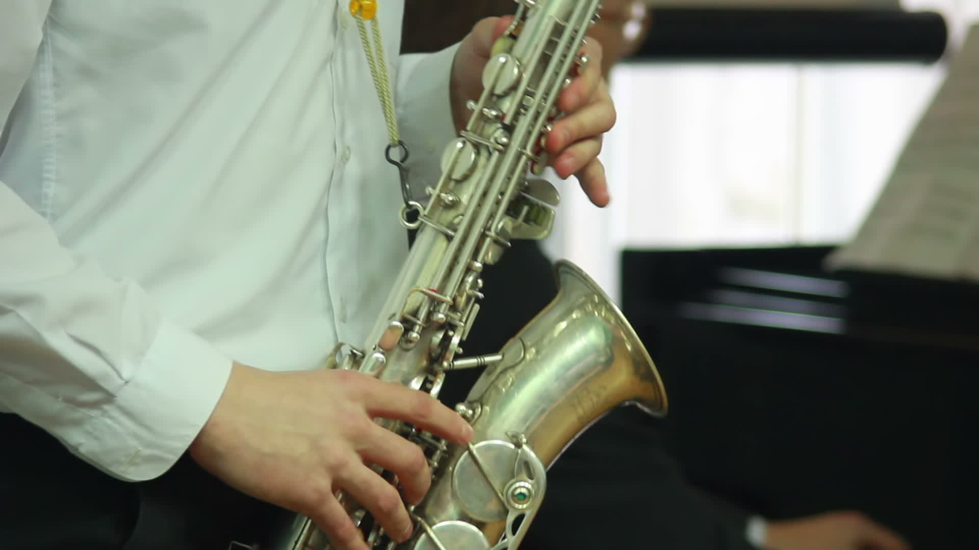 man's hands playing a wind instrument 13549514 Stock Video at Vecteezy