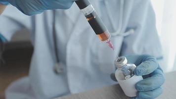 Medical Research Laboratory Portrait of a Female Scientist Wearing Face Mask Using Micro Pipette for Analysis. Advanced Scientific Lab for Medicine, Biotechnology Development. Close-up Shot video