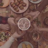 Digitally composed picture of wine glass over top view of four people cheering with red wine while sitting at the rustic dining table photo