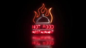restaurant de plats chauds néon led logo signe .led bannière enseigne de repas ou de dîner avec une réflexion sur le sol de la route pluvieuse humide. video