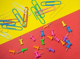 Paper work. Colored paper clips. Work with documents. Office. photo