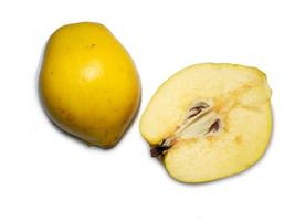 Juicy quince. Fruit on a white background. Ripe useful product. photo