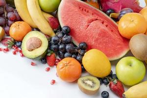 Set of colorful exotic fruits, oranges and watermelons. photo