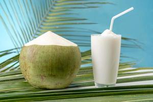 A glass of sweet coconut water coconut fragrance . photo