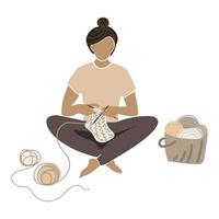 Young woman knitting with knitting needles sitting cross-legged, basket of yarn and balls of thread vector flat illustration in organic color.Handcraft Hobby Concept.home needlework.