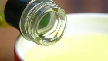 A bottle of vegetable oil close up video