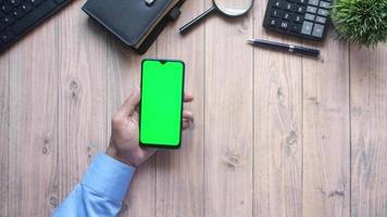 Man using smartphone at the work video