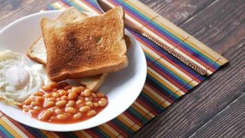 Plate of fried egg toast and baked beans video