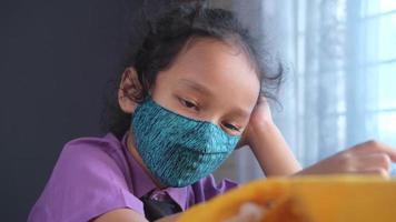 Kid waiting wearing a mask video