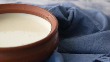 Close up of a bowl of cream, pudding, dessert video