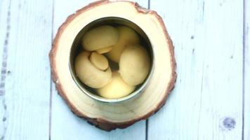 Top down view of canned mushrooms in water video