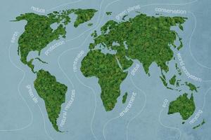 mundo verde. imagen de primer plano del mapa del mundo con textura de musgo en el fondo azul foto