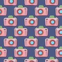 Pink camera , seamless pattern on a blue background. vector