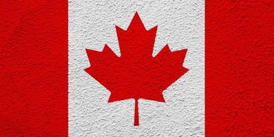 Canada flag on the texture. Concept collage. photo