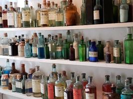 a shelf of old veterinarian supply photo