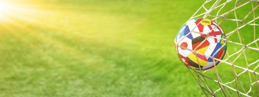 Soccer ball in the net of a goal. Soccer concept photo