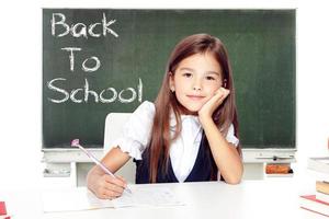 Portrait of modern, happy and cute teen school girl. photo