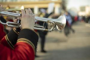 Military band in parade. Trumpeters on street. Trumpeter plays tune. Orchestra in Russia. photo