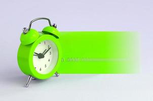 Small green alarm clock and blue credit card photo