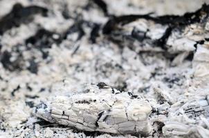 Pile of ashes after the fire went out grunge background texture photo