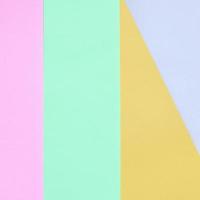 Texture background of fashion pastel colors. Pink, violet, orange and blue geometric pattern papers. photo