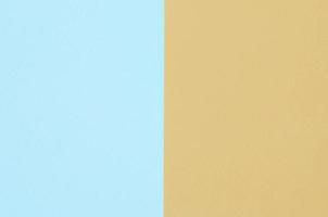Texture background of fashion pastel colors. Yellow, and blue geometric pattern papers. photo