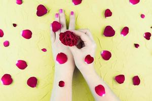 beauty hands with makeup flowers photo