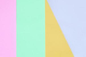 Texture background of fashion pastel colors. Pink, violet, orange and blue geometric pattern papers. photo