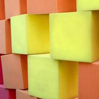 Wall of paralon soft cubes in dry pool, trampoline in the childrens center photo