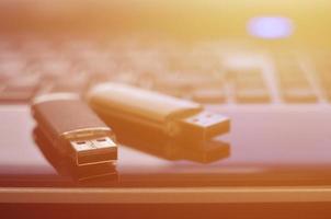 Memory cards on the laptop keyboard photo