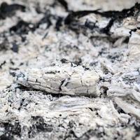 Pile of ashes after the fire went out grunge background texture photo