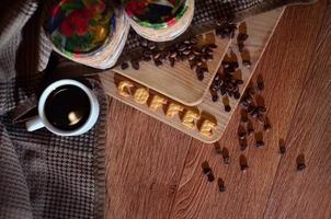 Coffee cup and a text, composed of crackers photo