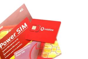 TERNOPIL, UKRAINE - JULY 5, 2022 Vodafone Power SIM mobile card by Vodafone group plc - British multinational telecommunications company who operates networks in 22 countries photo