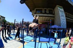 KHARKIV, UKRAINE - 27 MAY, 2018 Street workout show during the annual festival of street cultures photo