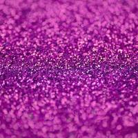 Pink decorative sequins. Background image with shiny bokeh lights from small elements photo