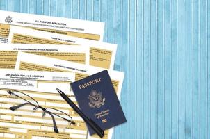 Department of State form DS11 Application for a U.S. Passport lies on table and ready to fill. Paperwork during operations with US Passport concept photo