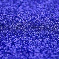 Blue decorative sequins. Background image with shiny bokeh lights from small elements photo