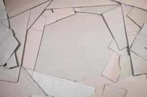 Background of paper textures piled ready to recycle. A pack of old office cardboard for recycling of waste paper. Pile of wastepaper photo