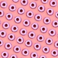 Many small plastic donuts lies on a pastel colorful background. Flat lay minimal pattern. Top view photo