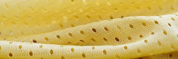 Yellow mesh sport wear fabric textile background pattern photo