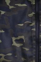 Textile pattern of military camouflage fabric photo