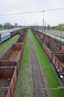PAVLOGRAD. UKRAINE - MARCH 4, 2019 A huge number empty freight cars are in the Pavlograd railway de photo