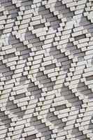 A pattern made of white bricks in the form of diamond shapes. Decoration of the walls during the Soviet Union photo