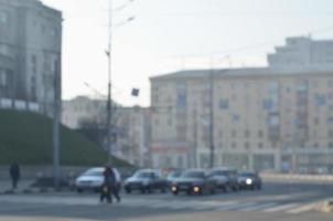 Blurred landscape of highway with cars in foggy morning photo